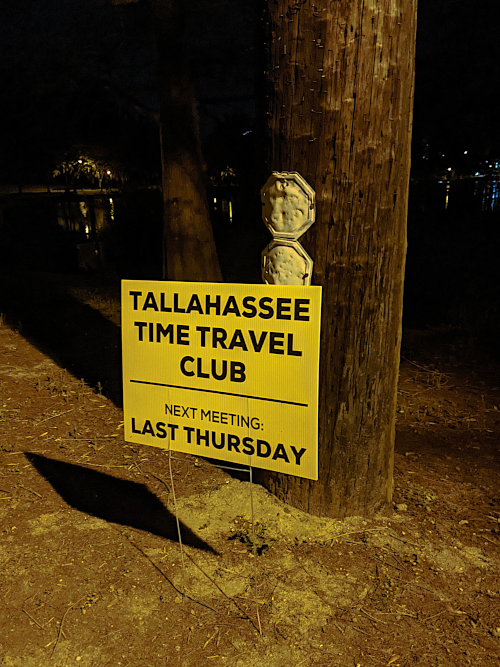 time travel club sign