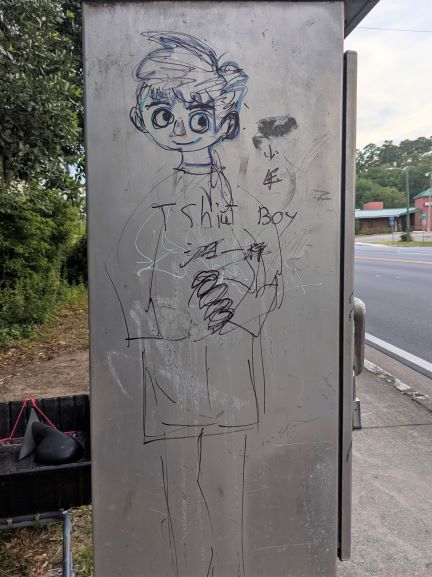 graffiti of a cute boy in a t-shirt